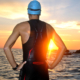 Chiropractor Rockville, MD - young athlete triathlon in front of a sunrise
